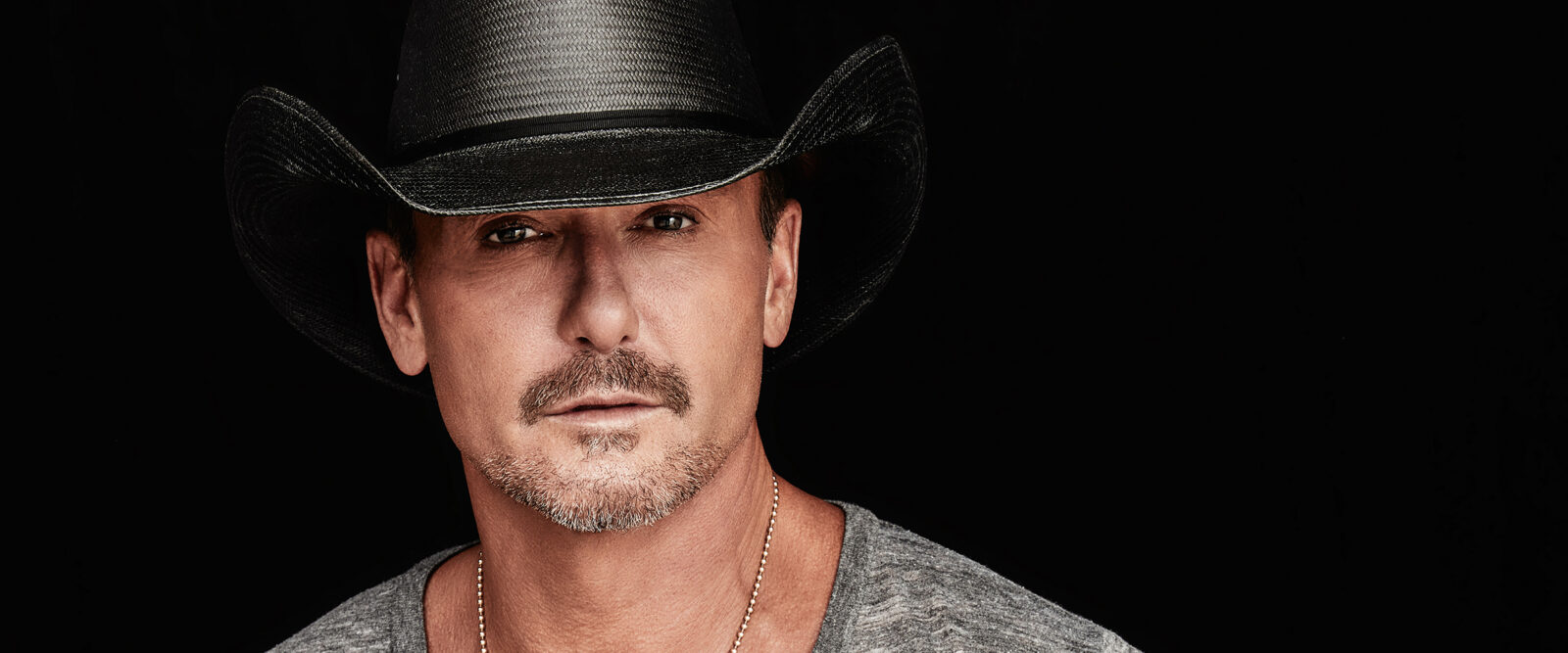 TIM MCGRAW </br> with KIP MOORE banner image.